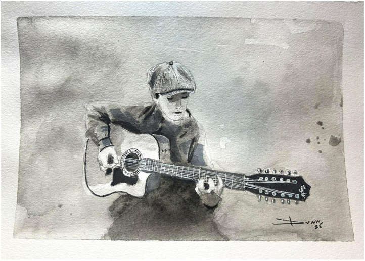 Vieil homme à la guitare
